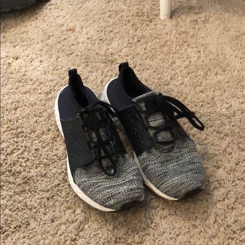 gray and black new balance shoes